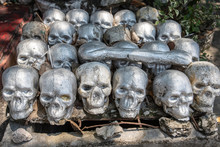 Many Silver Skulls In A Row. Religious Sculpture.