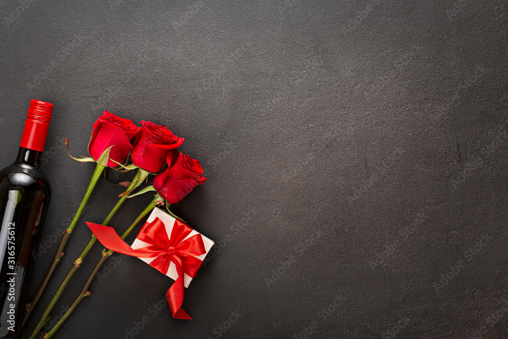Obraz na płótnie 14.02. Wine, roses and gift box with a red bow. Love concept w salonie