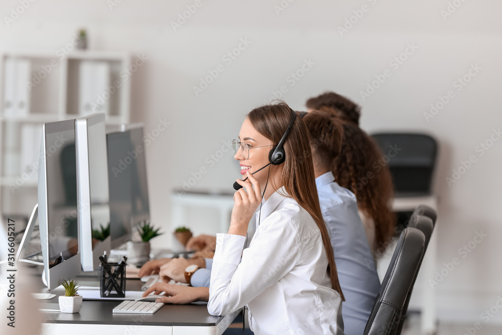 Technical support agents working in office
