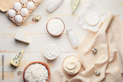 Fotografía Different dairy products on wooden background