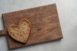 heart shaped slice of healthy brown bread