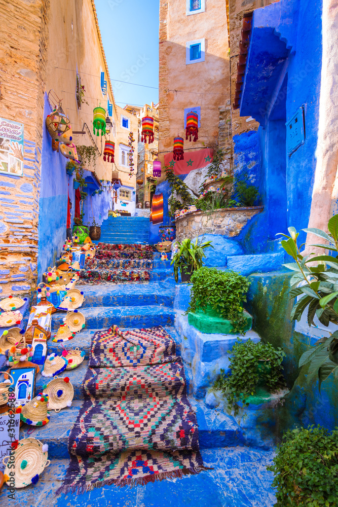 Chefchaouen, a city with blue painted houses and narrow, beautiful, blue streets, Morocco, Africa - obrazy, fototapety, plakaty 