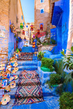 Fototapeta Uliczki - Chefchaouen, a city with blue painted houses and narrow, beautiful, blue streets, Morocco, Africa