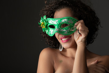 Brazilian Carnival. Young woman in costume enjoying the carnival party.