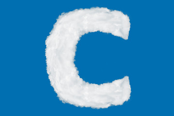 Letter C font shape element made of clouds on blue background over sky