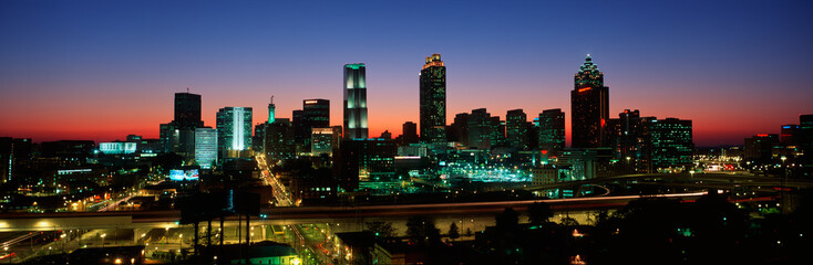Fototapete - This is the skyline after the 1996 Olympics. It is the view at dusk.