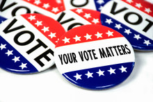 Collection Of Election Campaign Vote Pins On White