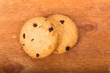 Chocolate cookies on wooden table. Chocolate chip cookies