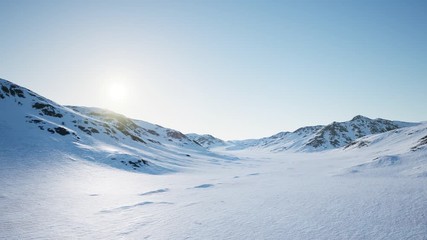 aerial landscape of snowy mountains and icy shores in antarctica