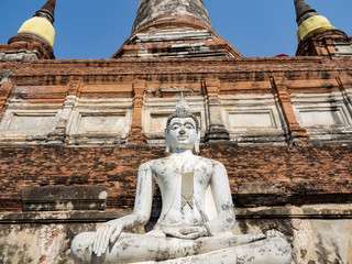 Wall Mural - Thai architecture Ancient times,Most materials are brick and mortar,forming a wall and floor,The surrounding area has a beautiful Buddha statue,On the bright day