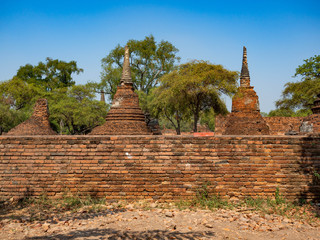 Wall Mural - Thai architecture Ancient times,Most materials are brick and mortar,forming a wall and floor,The surrounding area has a beautiful Buddha statue,On the bright day