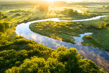 Summer Morning On The River With Fog, Aerial View. River Located Between Forest And Green Fields