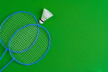 Wall Mural - Badminton equipment. Rackets and shuttlecock, top view