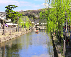 Wall Mural - People in old-fashioned boat, Kurashiki city, Japan