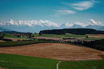 Wall Mural - Summer view of a beautiful apline village in Switzerland