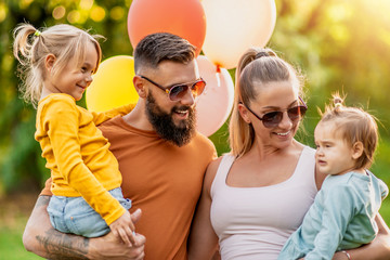 Wall Mural - Cheerful family on vacation enjoying outdoors