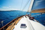 Fototapeta Sawanna - yacht bow in Mediterranean sea in the middle of the sunny summer day