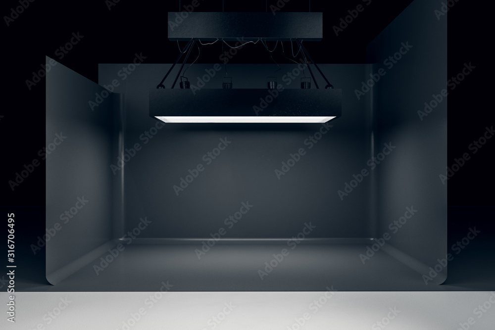 Photo studio with lighting equipment and black background - obrazy, fototapety, plakaty 