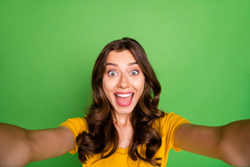 Poster - Self-portrait of her she nice attractive lovely cheerful cheery crazy ecstatic wavy-haired girl having fun free time isolated over bright vivid shine vibrant green color background