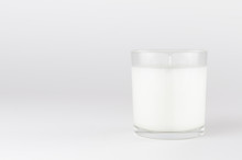 White Candle In Transparent Glass On White Background, Mock Up For Branding Identity Product, Advertising, Presentation, Design Of Packing.