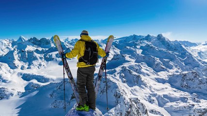 Fototapete - Aerial view of skiing with amazing view of swiss famous mountains in beautiful winter snow  Mt Fort. 