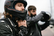 © Drobot Dean - Photo of bearded brutal men bikers wearing helmets looking forward
