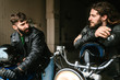 © Drobot Dean - Photo of bearded bikers talking while sitting on their bikes