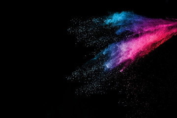 explosion of colored powder isolated on black background. abstract colored background. holi festival