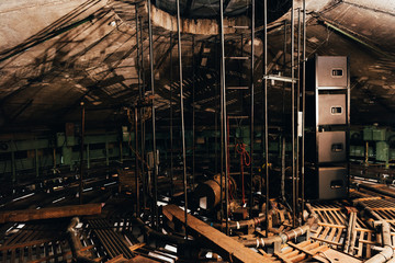 Technical constructions with ladders and speakers in circus warehouse