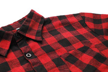 Red & Black Lumberjack Plaid Shirt With Tartan Check Pattern. Close Up View Of Scottish Style Colorful Shirt, Dark Red And Black Hipster Outfit Detail For Women And Men 