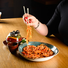 Wall Mural - Traditional Japanese food - udon noodles with chicken and mushrooms