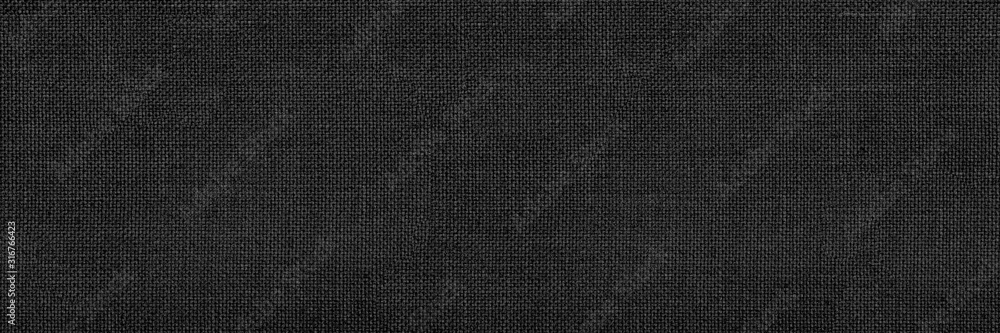 Panoramic close-up texture of natural weave cloth in dark and black color. Fabric texture of natural cotton or linen textile material. Black fabric wide background. - obrazy, fototapety, plakaty 
