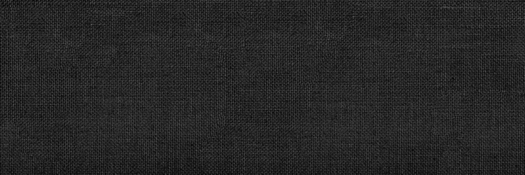 panoramic close-up texture of natural weave cloth in dark and black color. fabric texture of natural