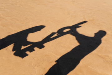 Sticker - shadow of letters forming the word love.