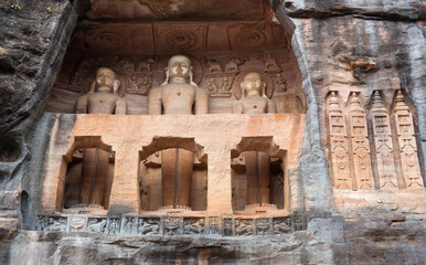 Wall Mural - Ancient Jain statues carved out of rock in Gwalior fort, Madhya Pradesh, India