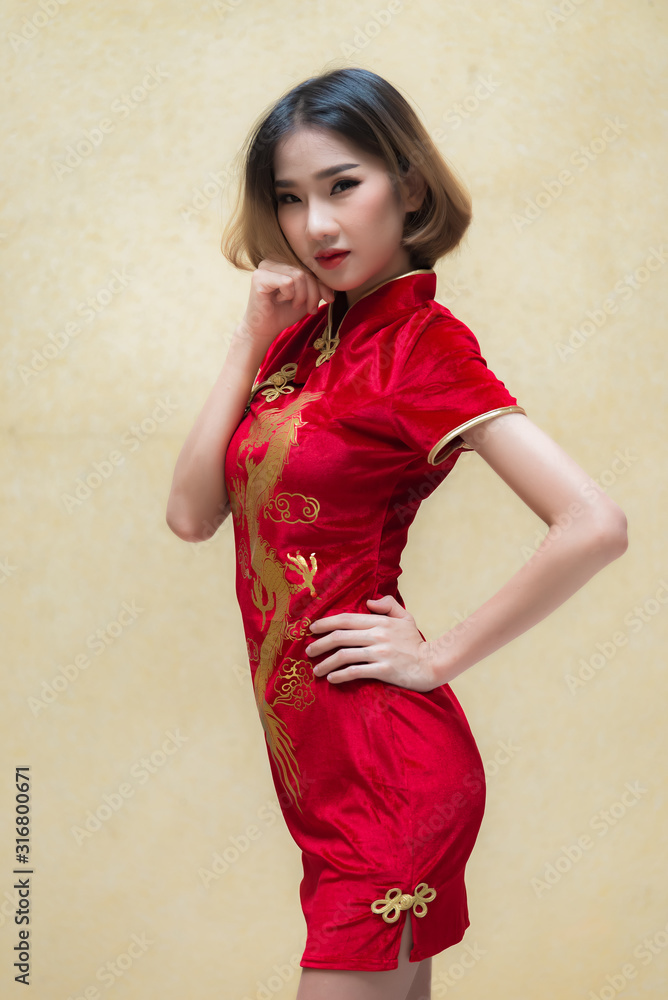 Portrait beautiful asian woman in Cheongsam dress,Thailand people,Happy  Chinese new year concept,Happy asian lady in chinese traditional dress  Stock Photo | Adobe Stock