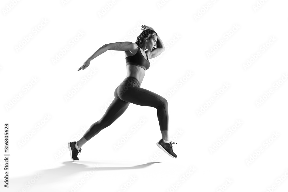Sports background. Runner on the start. Black and white image isolated on white. - obrazy, fototapety, plakaty 