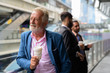 © Ranta Images - Three multi ethnic bearded businessmen together around the city