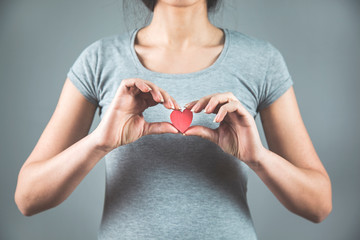 Poster - woman hand red heart