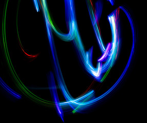 Wall Mural - Abstract color pattern of luminous stripes on a black background, bright and smooth color streaks