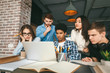 © Prostock-studio - Concentrated classmates doing their project at library together