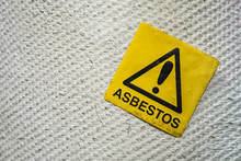 Asbestos Warning Sign On A Pipeline.