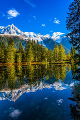 Canvas Print - Reflections of snowy peaks