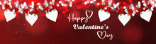Happy Valentine's Day Background Banner Panorama - White Heart Hang On Wooden Clothes Pegs With Wooden Heart And Bokeh Lights On A String Isolated On Red Texture With Bokeh Lights, With Space For Text