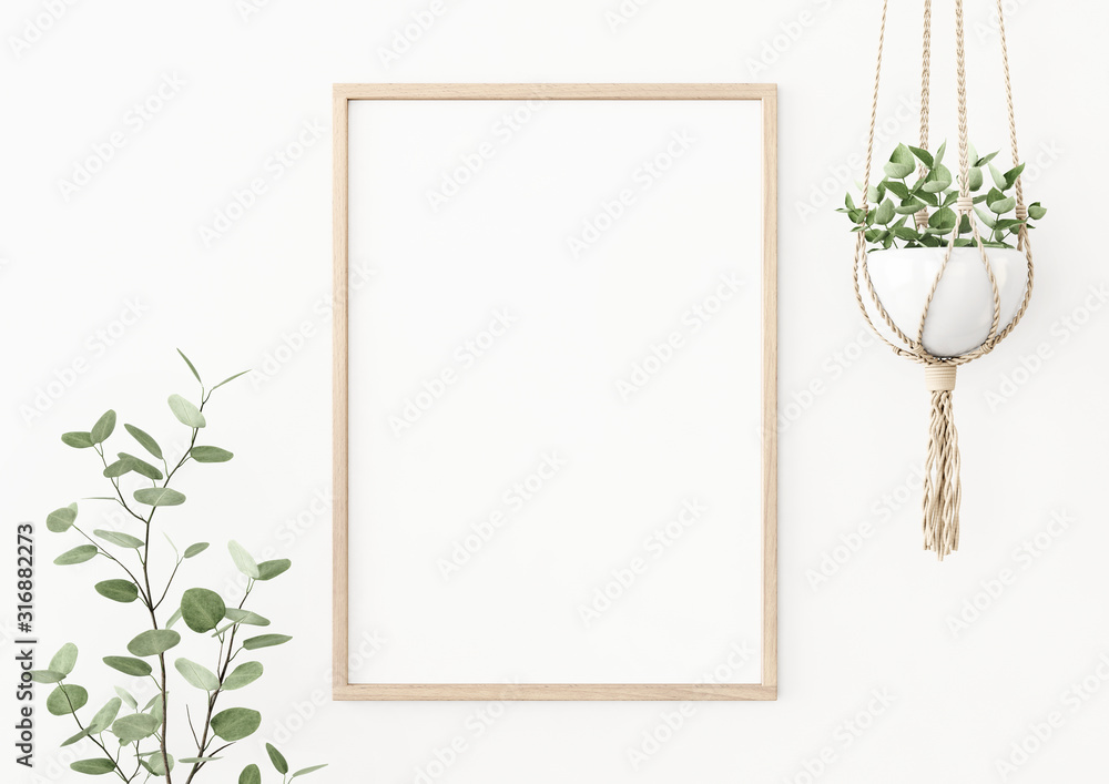 Interior poster mockup with vertical wooden frame on empty white wall ...