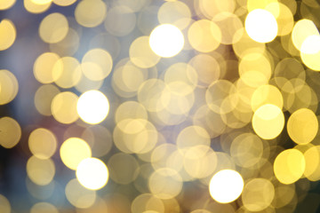 Wall Mural - background with blurred circles of lights. defocused lights of festive garland 