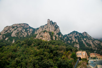 BARCELONA, SPAIN - December 26, 2018: The mountains of Montserrat in Barcelona, Spain. Montserrat  is a Spanish shaped mountain which influenced Antoni Gaudi to make his art works.