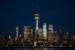 Lower Manhattan and One World Trade Center in New York City, USA as seen from  New Jersey durin night