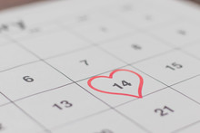 Date Of February 14 On The Calendar, Valentine's Day Red Heart Encircled.