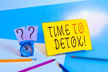 Conceptual hand writing showing Time To Detox. Concept meaning when you purify your body of toxins or stop consuming drug Mini size alarm clock beside stationary on pastel backdrop